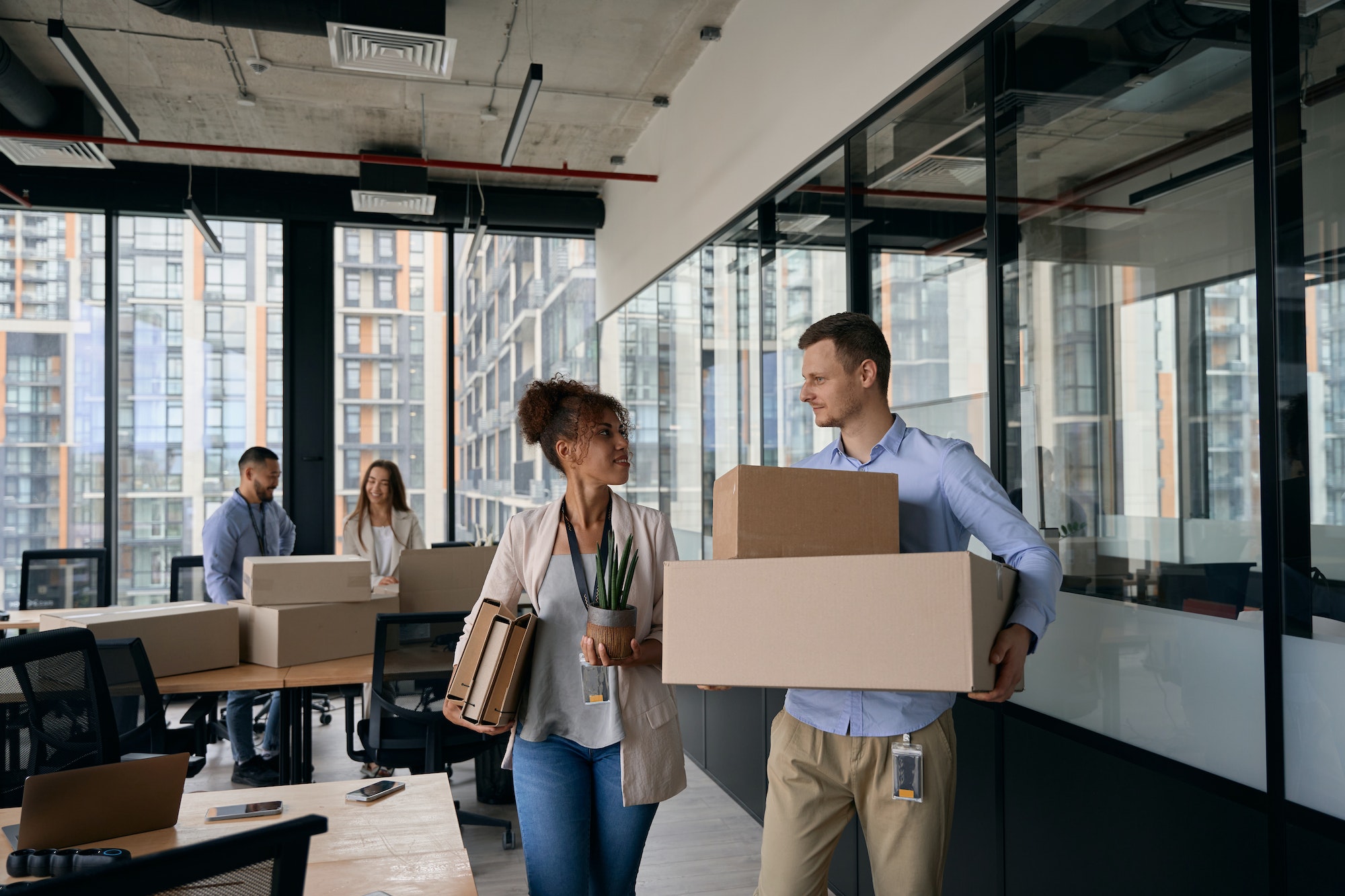 young-company-employees-preparing-for-office-moving.jpg